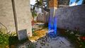 Take the Teleporter and place it on the other side of the grate.