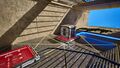 Move the Hexahedron to the top Pressure plate to open the Blue door blocking the red beam and finish the puzzle.