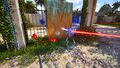 Grab the Inverter through the hole, connect it to the red Connector and blue Receiver and place it down next to the other bronze wall.