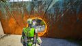 Walk around the wall and grab the Jammer from the other side of the hole.