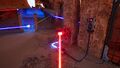 Position yourself in front of the red Emitter. By blocking the beam, this allows the blue Emitter to take over priority.